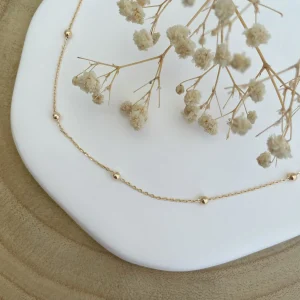 collier chaîne perlée grands billes - plaqué or