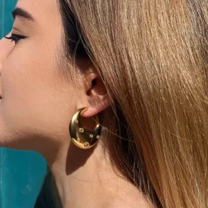 boucle d'oreille créole bombée fleurs dorée